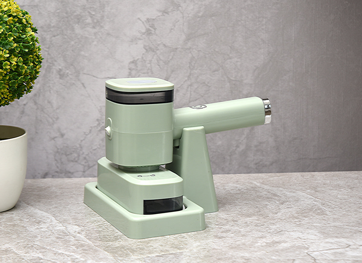 a green machine on a marble surface