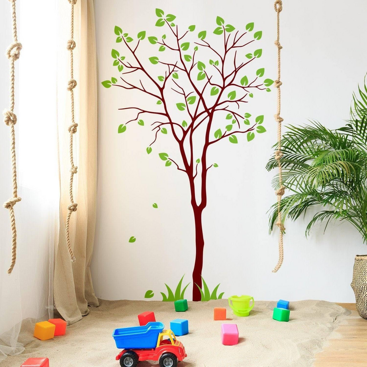 a room with a tree and toys