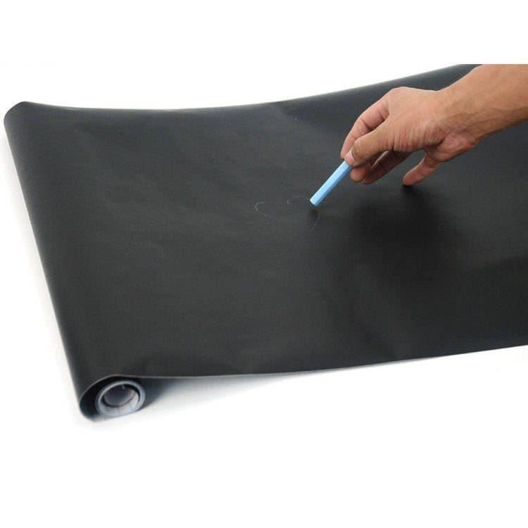 a hand drawing on a black paper