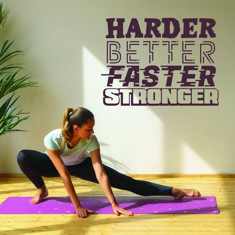 a woman stretching on a yoga mat