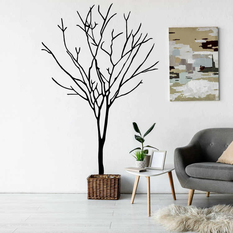 a couch and a table in front of a wall