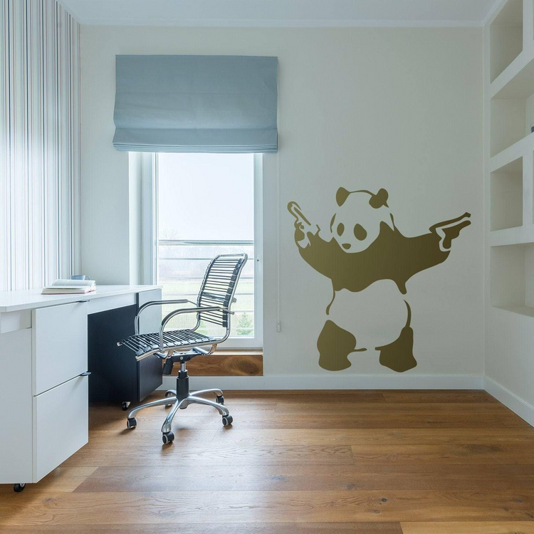 a room with a desk and a chair and a panda on the wall