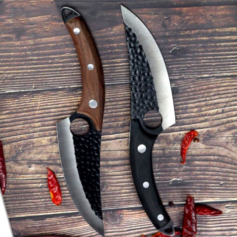 a pair of knives on a table
