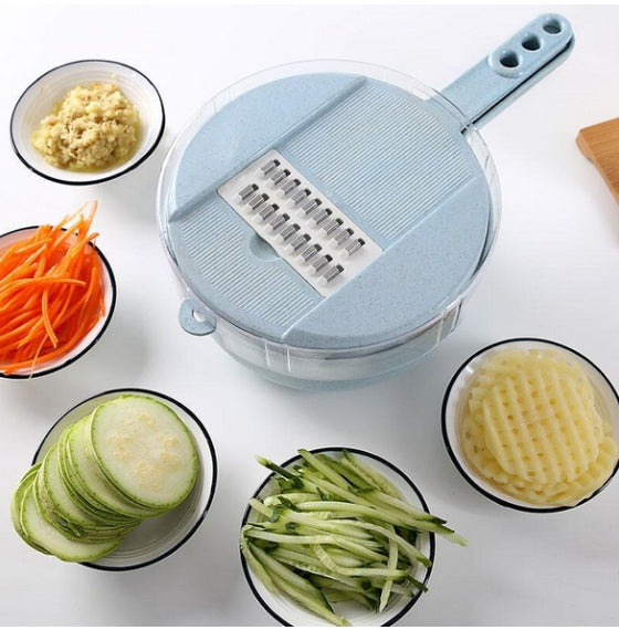 a bowl of vegetables and a grater