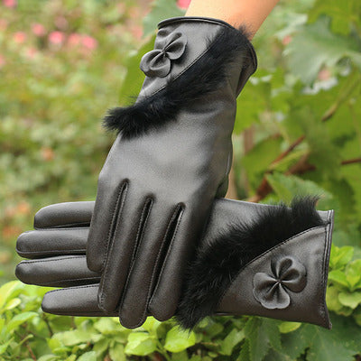 a pair of black gloves