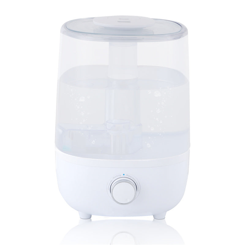 a white humidifier with a clear container