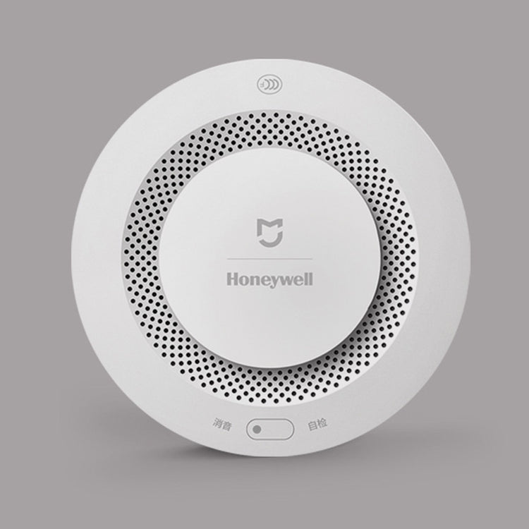 a white circular object with holes