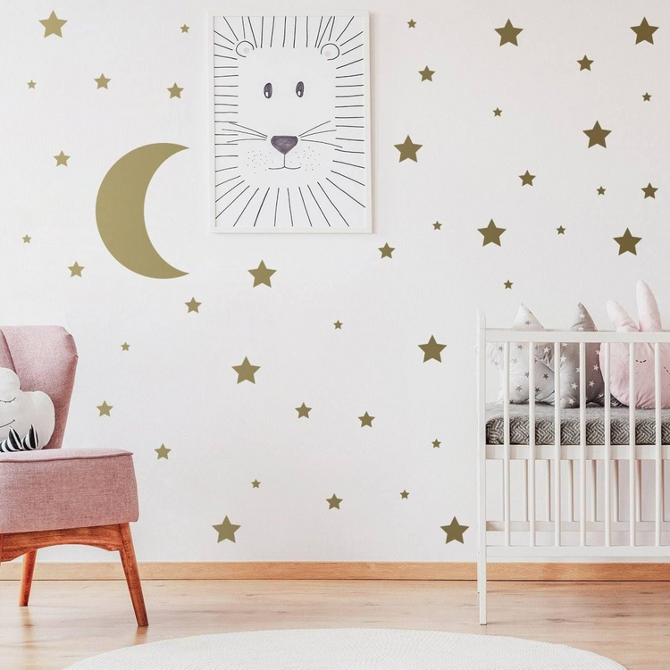 a baby room with a crib and a chair
