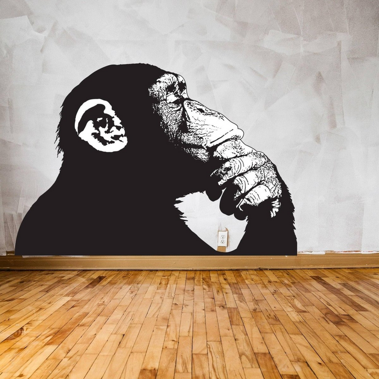 a monkey painted on a wall