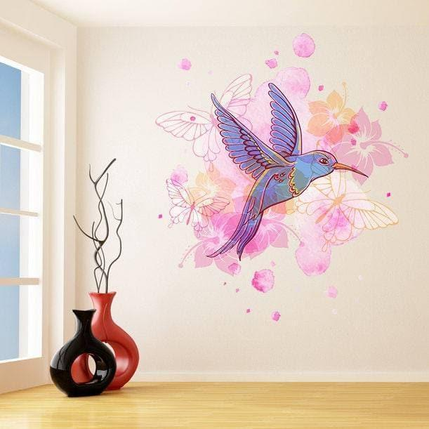 a wall with a bird and flowers