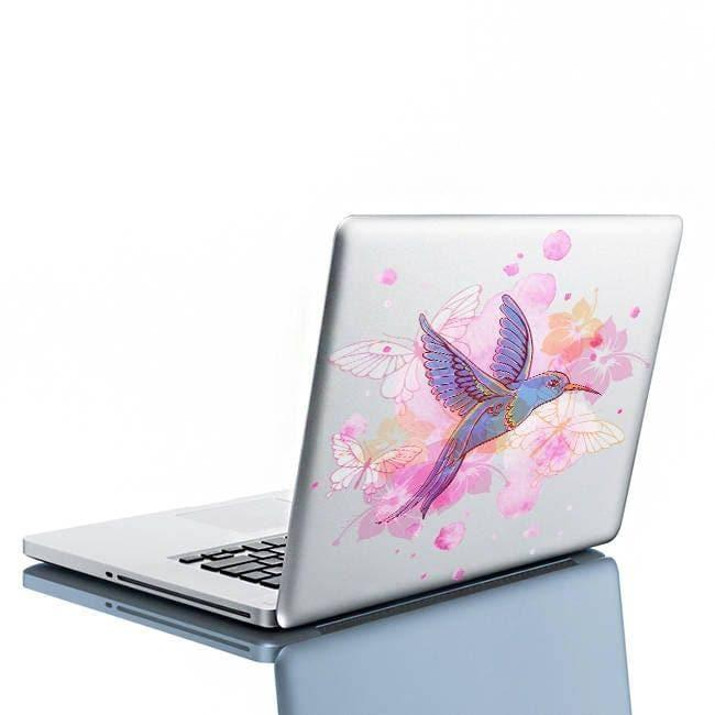 a laptop with a bird decal on the back