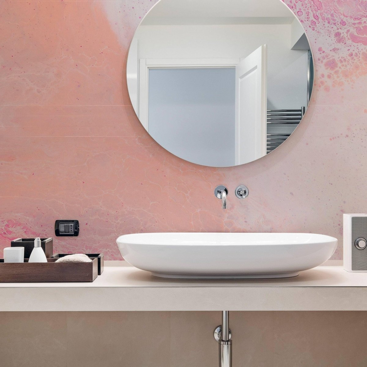 a sink and mirror on a counter