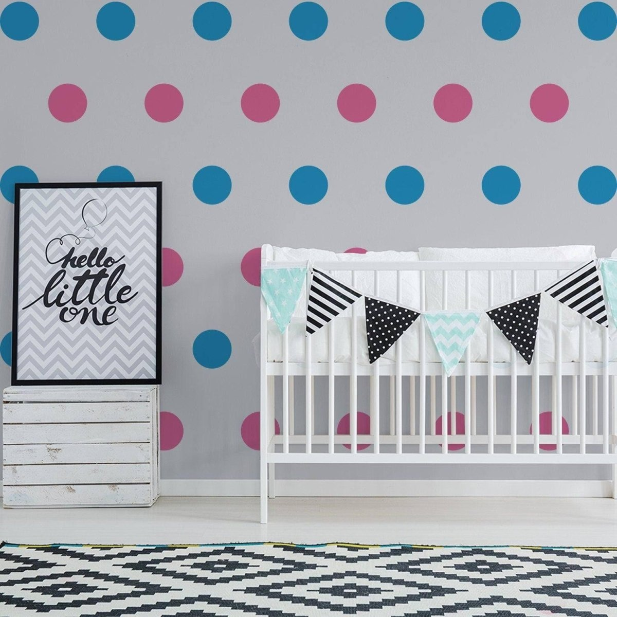 a baby room with a crib and a poster