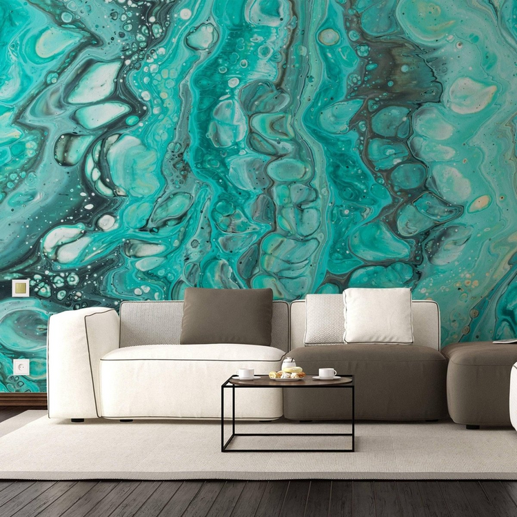 a couch in a room with a blue and green wall