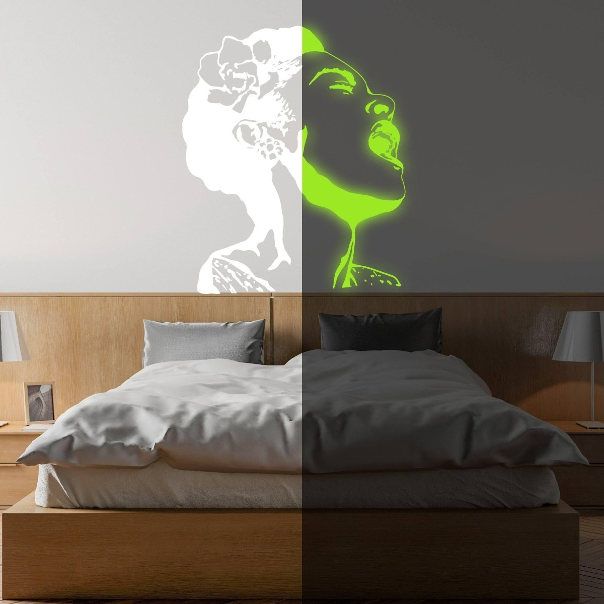 a room with a bed and a picture of a woman