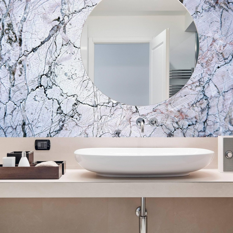 a sink and mirror on a counter