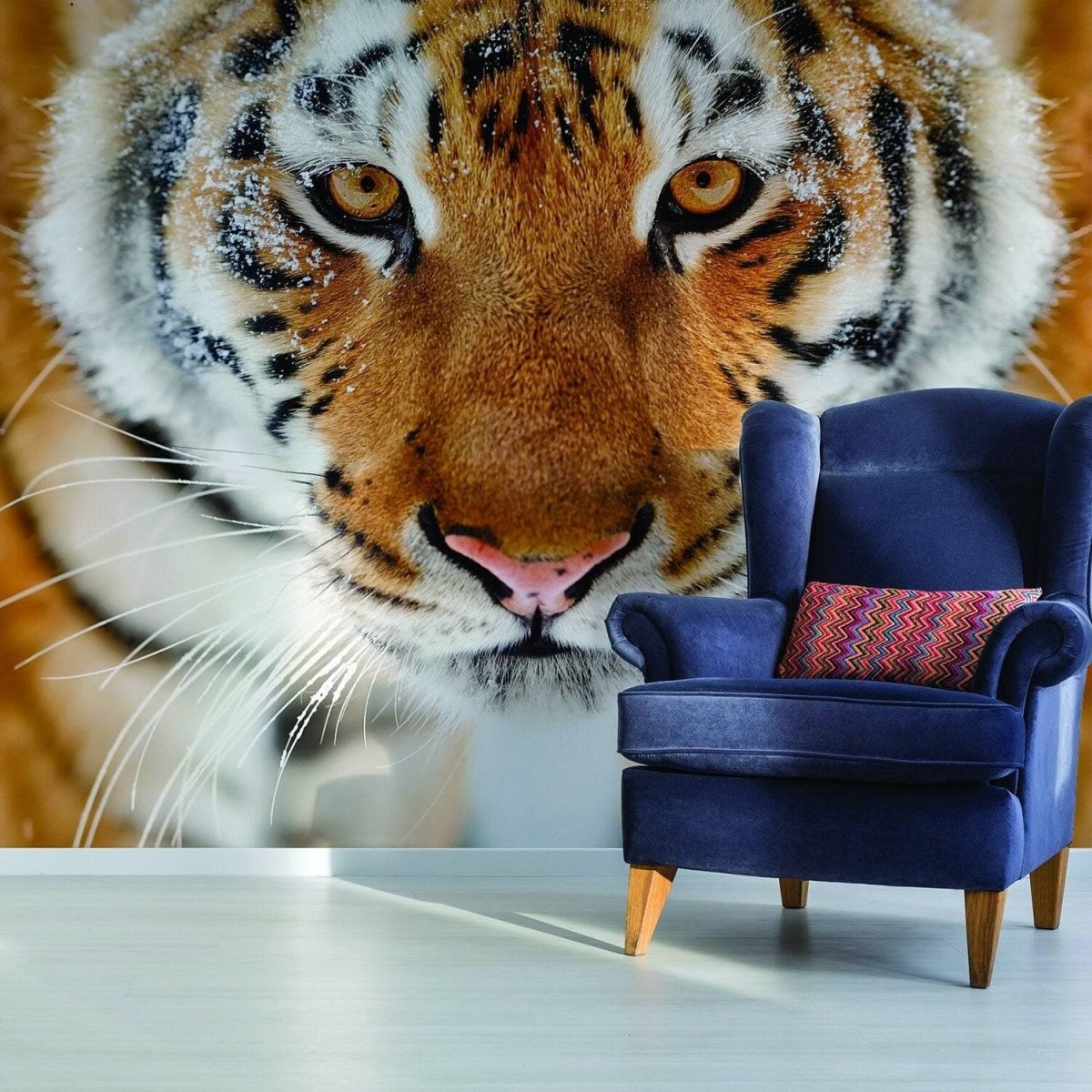 a blue chair and a tiger's face