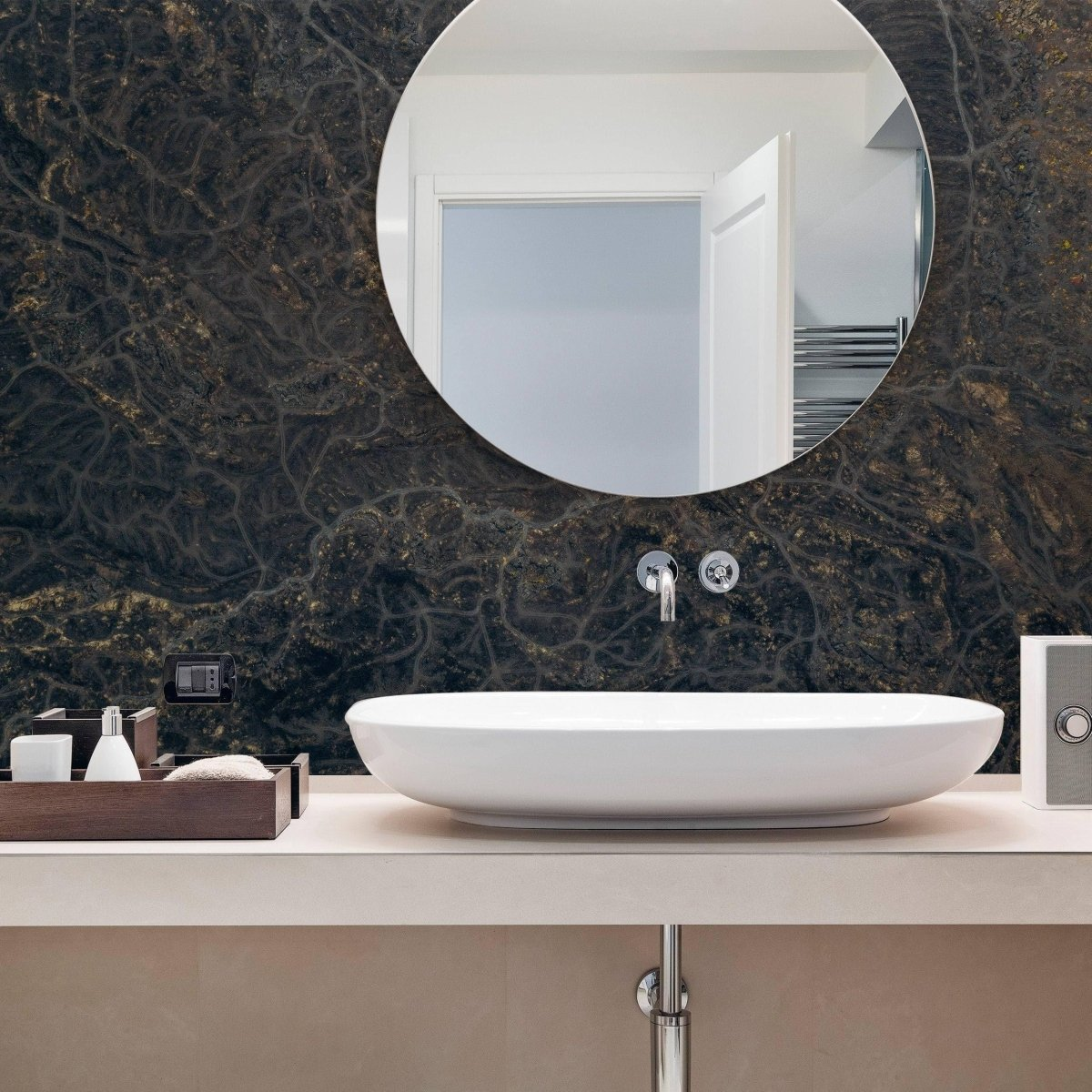 a sink and mirror on a counter