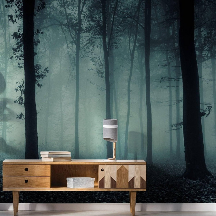 a table with a lamp and books on it