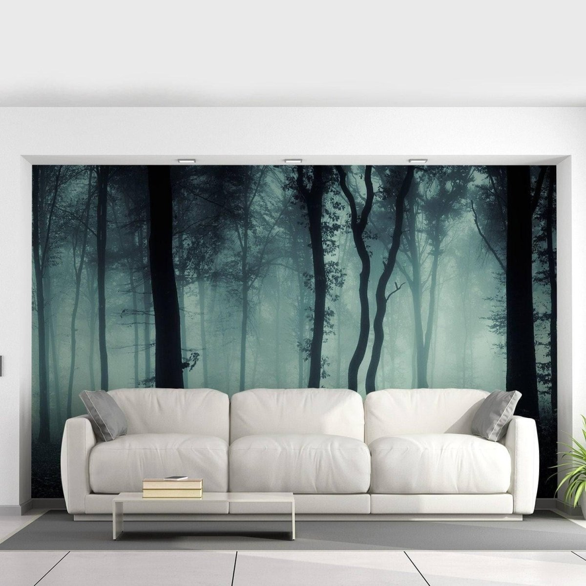 a white couch in a room with a wallpaper