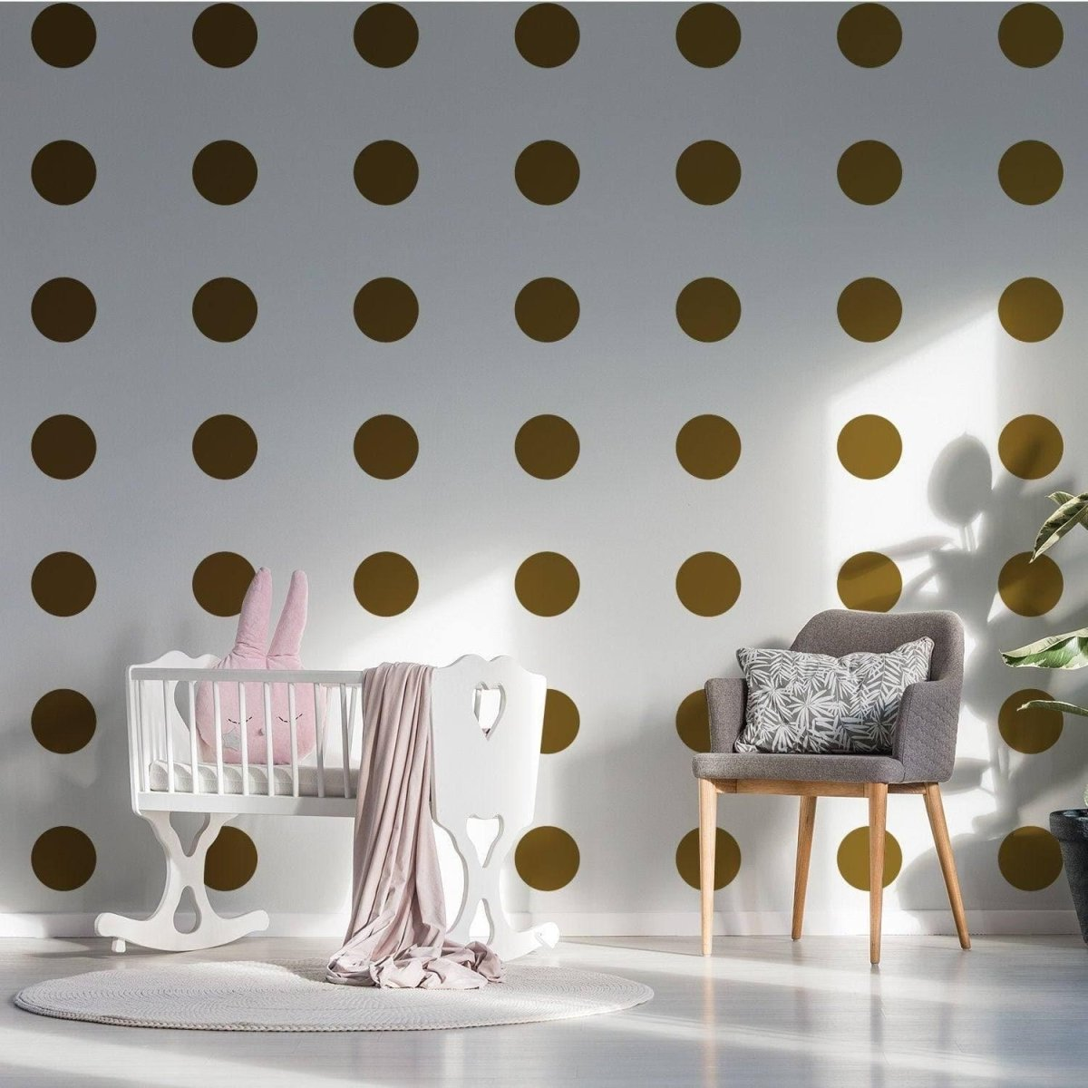 a baby room with a crib and chair
