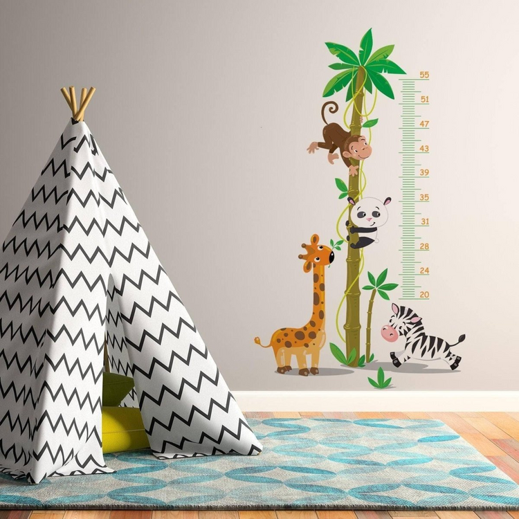 a wall decal of a teepee with animals
