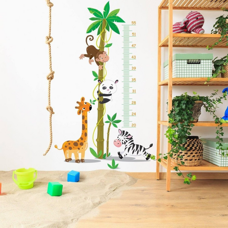 a wall decal with animals and toys on it