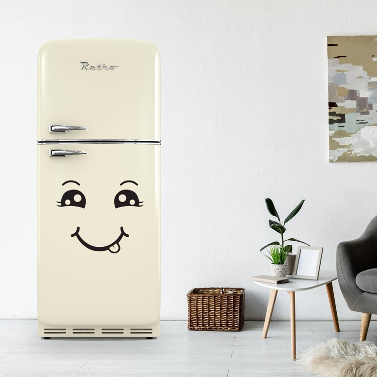 a white refrigerator with a face drawn on it
