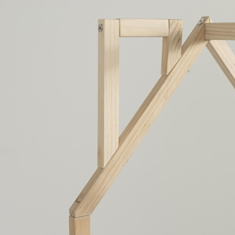 a wooden frame with a couple of bolts