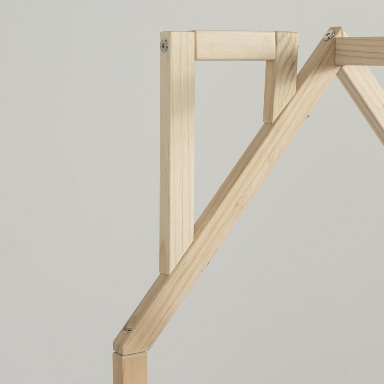 a wooden frame with a couple of bolts