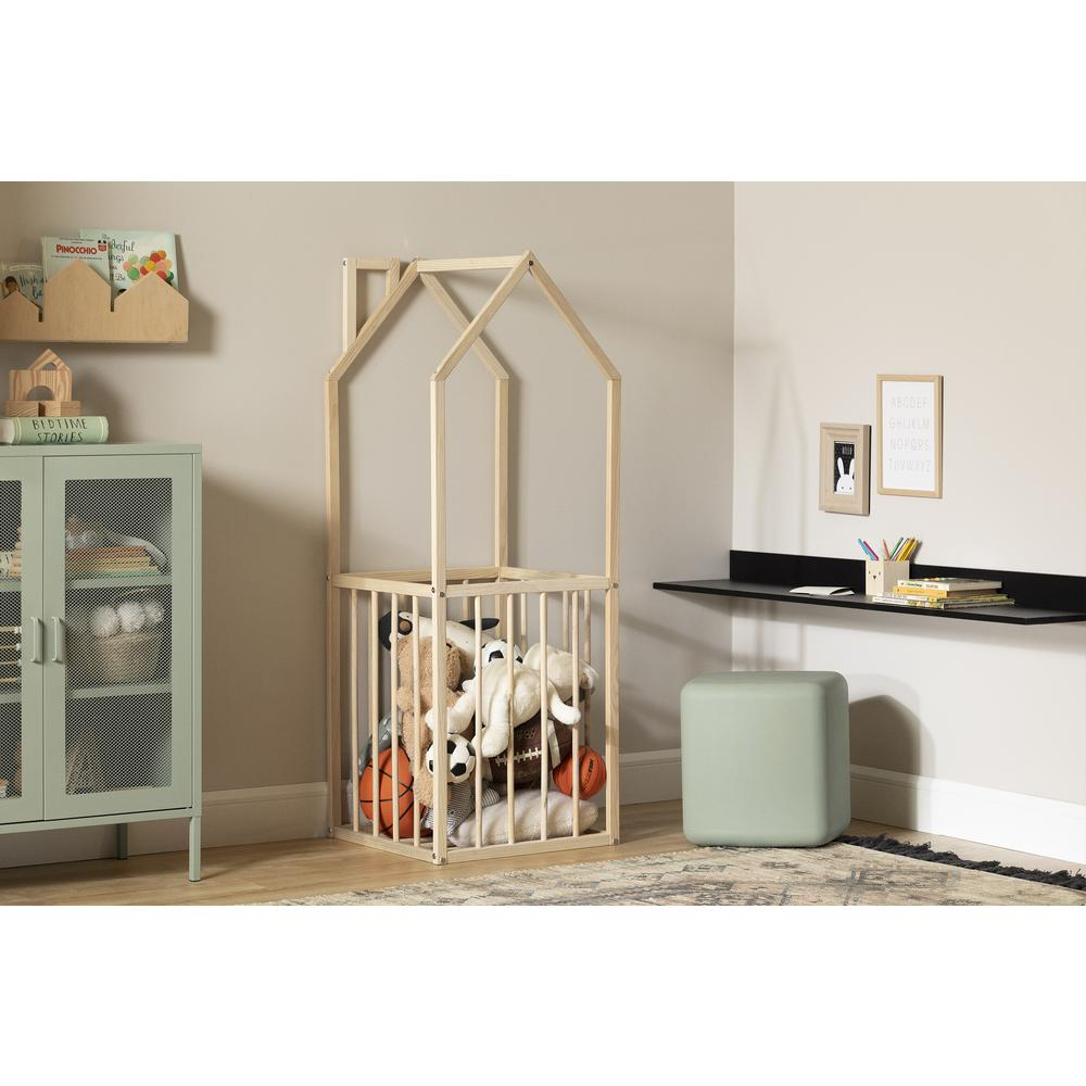 a baby crib with stuffed animals in it