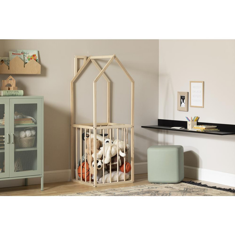 a baby crib with stuffed animals in it