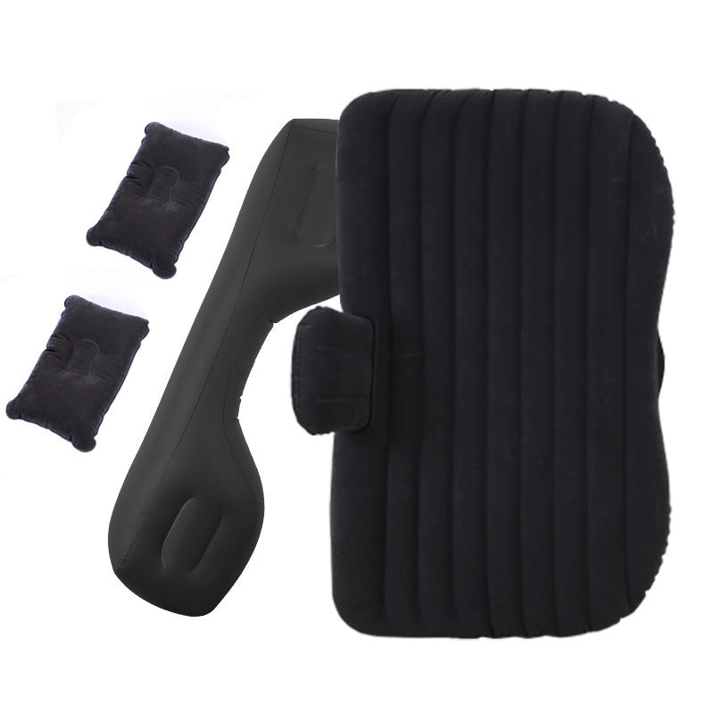 a black pillow with a neck pillow and three small black pillows