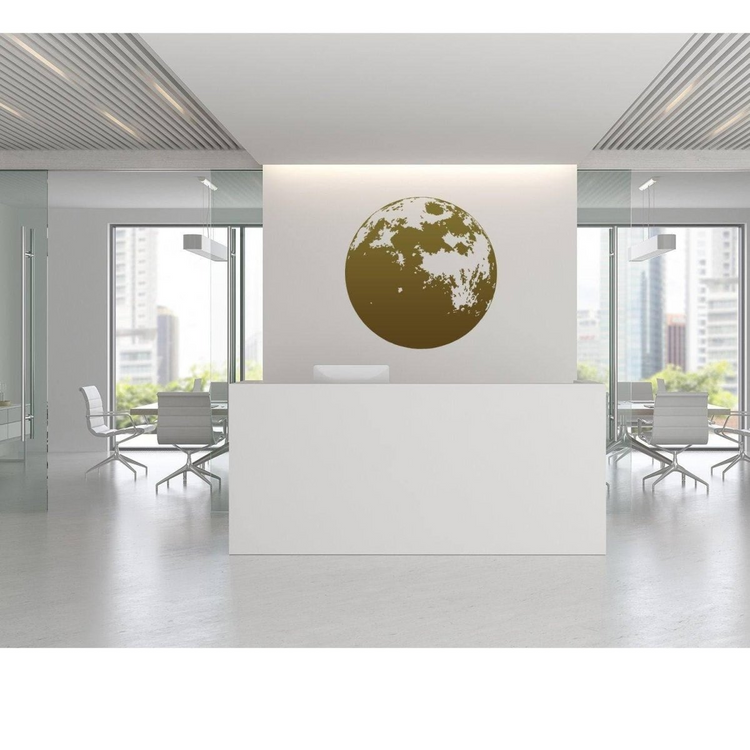 a white reception desk in a room with chairs and a large globe