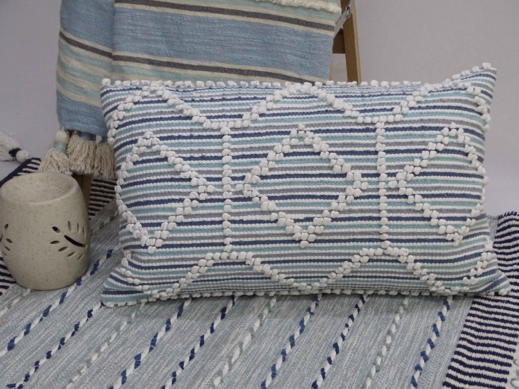 a pillow on a rug