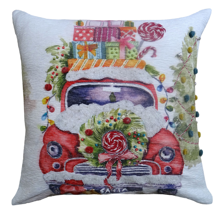 a pillow with a picture of a truck and presents