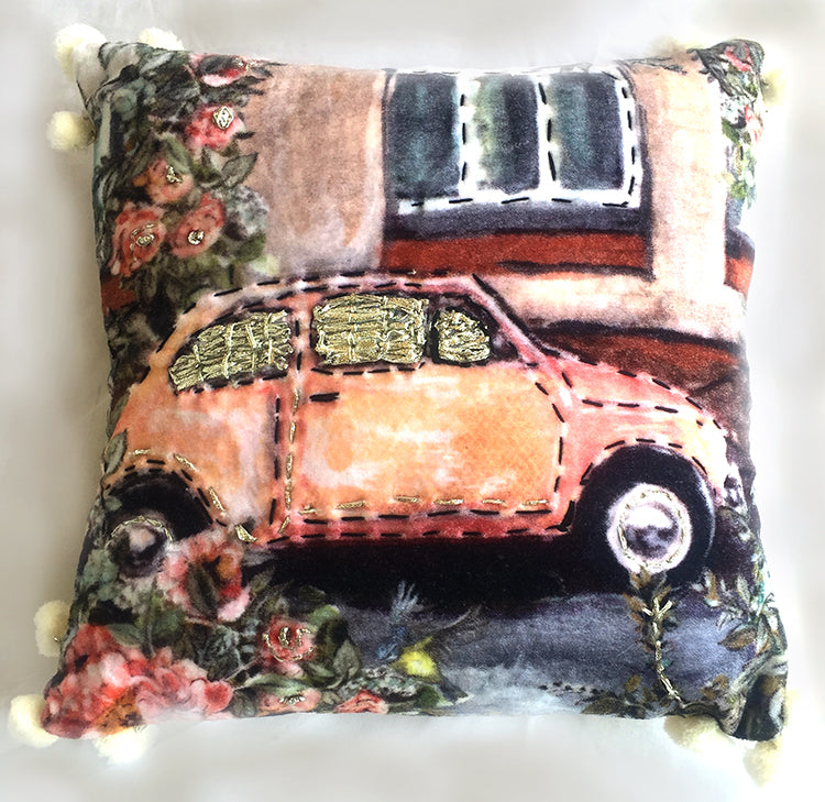 a pillow with a car on it