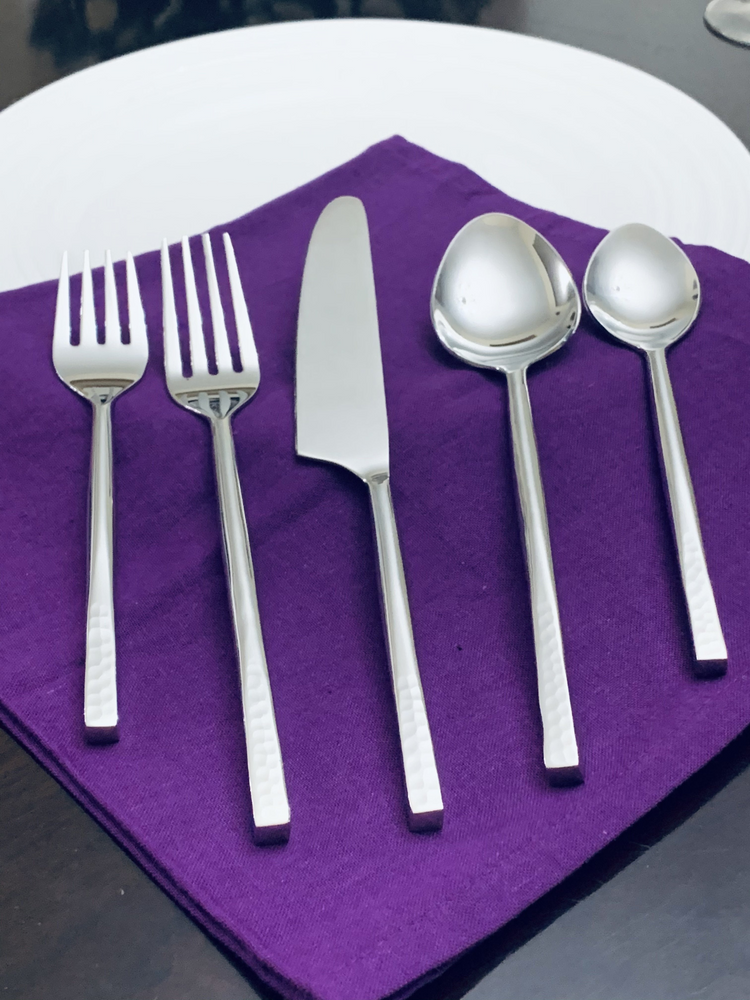 a silverware on a napkin