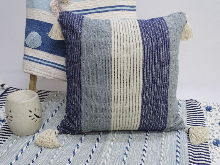 a blue and white striped pillow