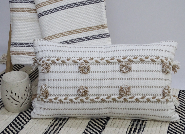 a white and brown pillow