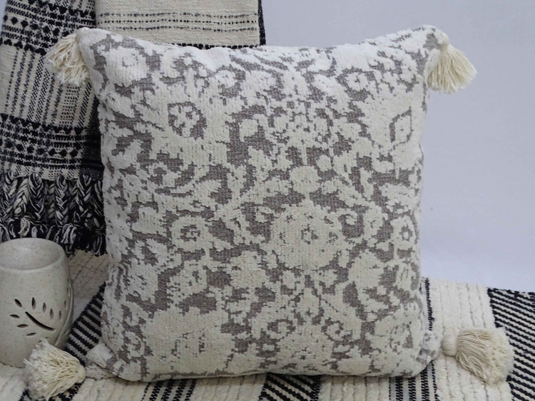 a pillow on a rug