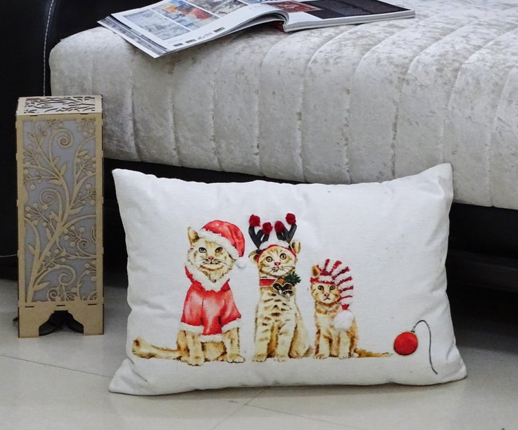 a pillow with cats on it