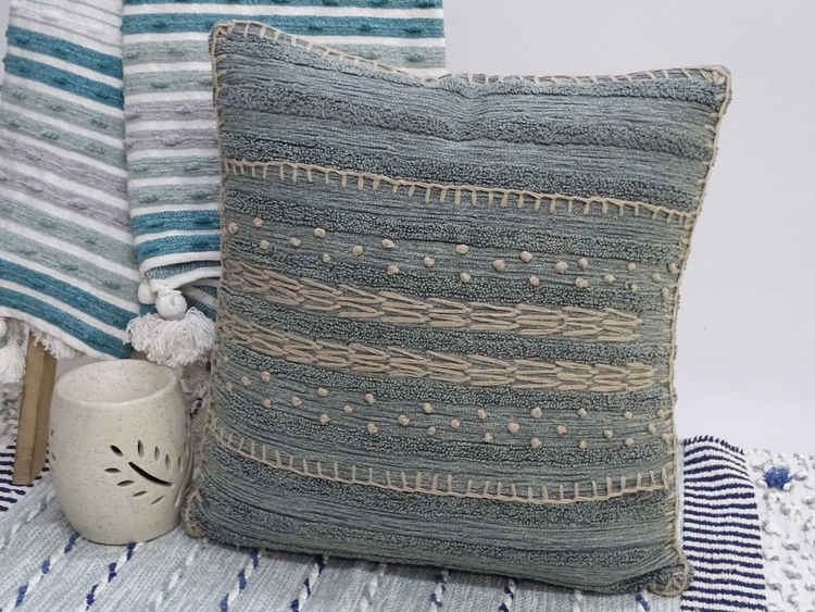 a pillow on a bed