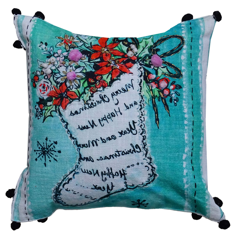 a pillow with a picture of a boot and flowers