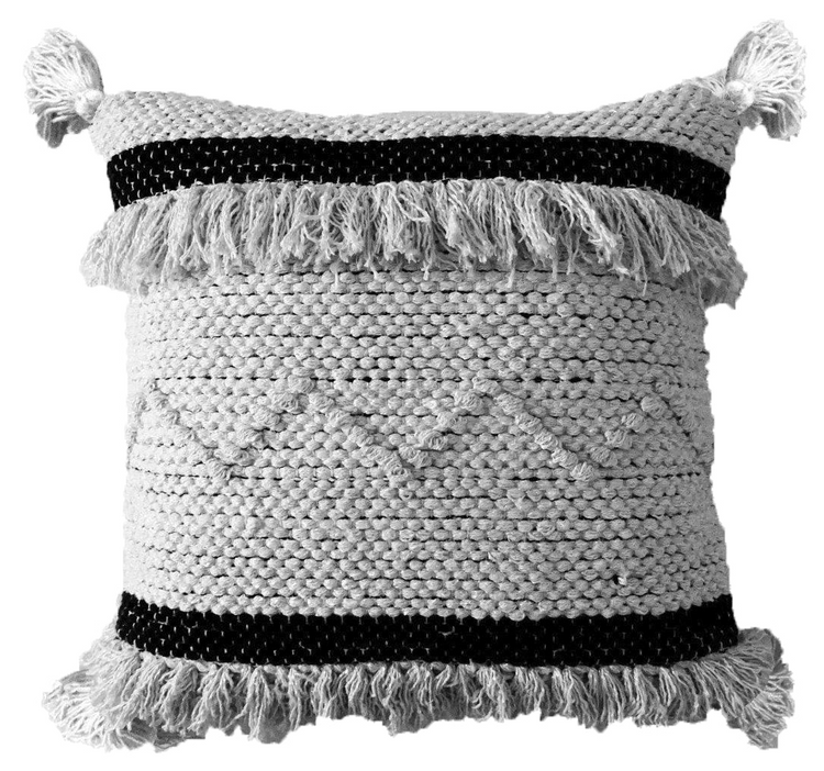 a pillow with fringes on it