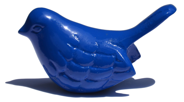 a blue bird statue on a white background