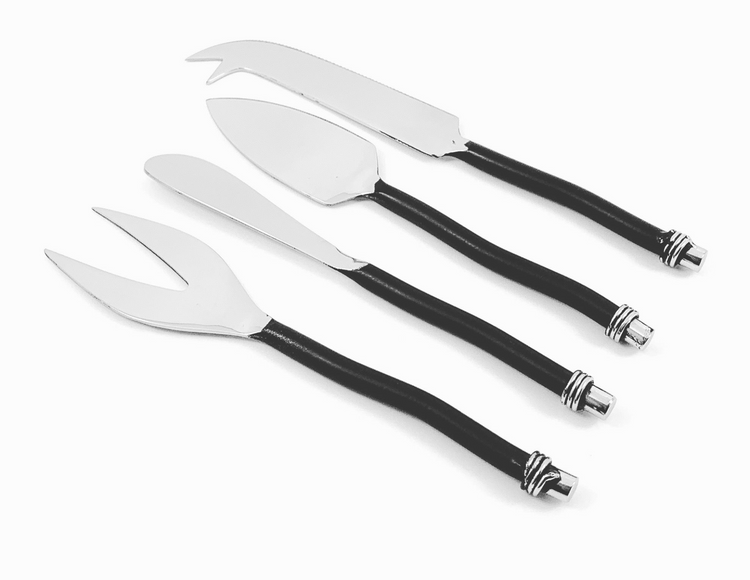 a group of knives with black handles