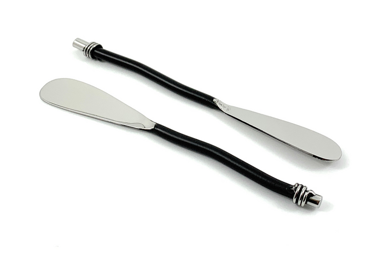 a pair of metal utensils