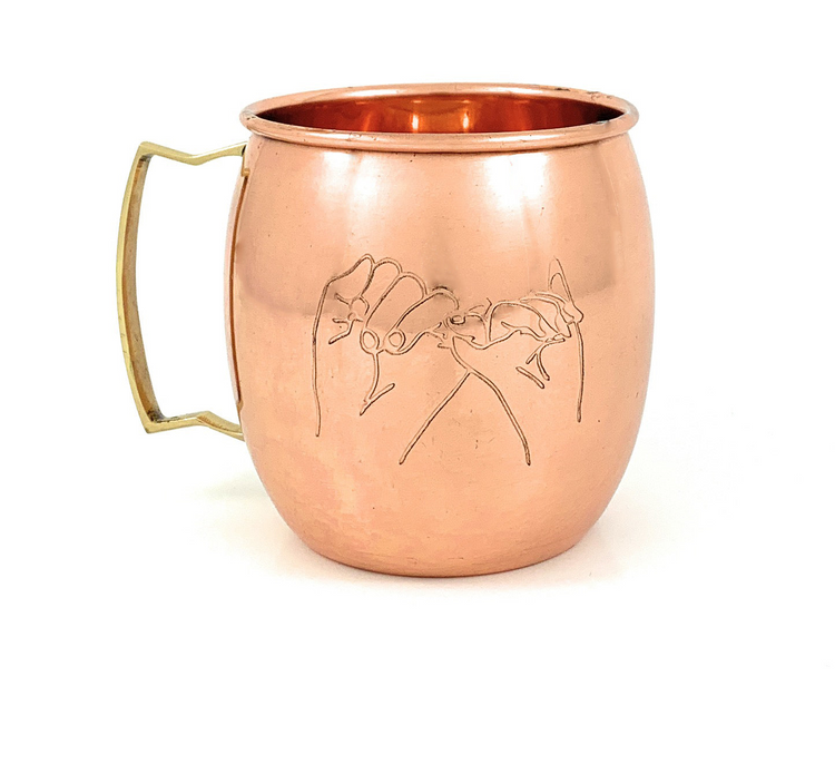 a copper mug with a handle