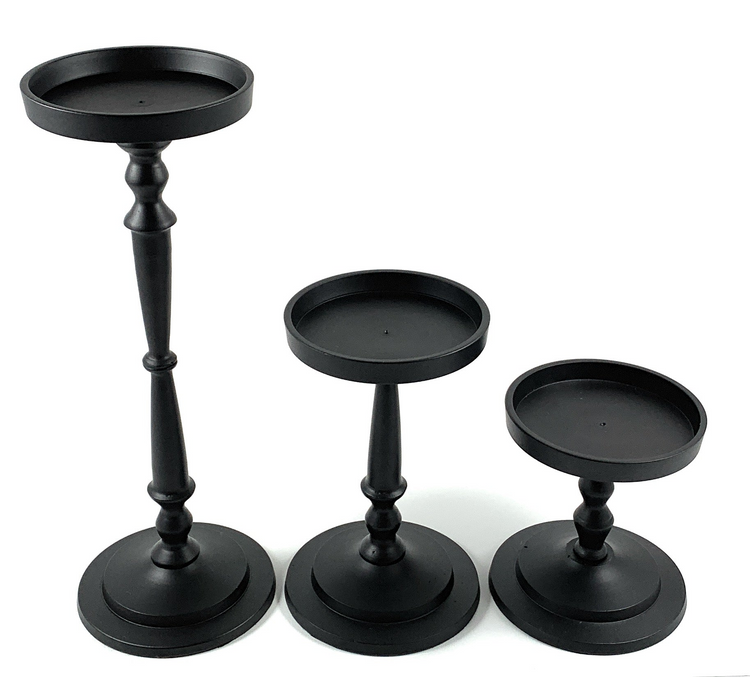a group of black candlesticks